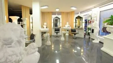 Unternehmen Haar Colosseum- Inh.: Fabian Berweger