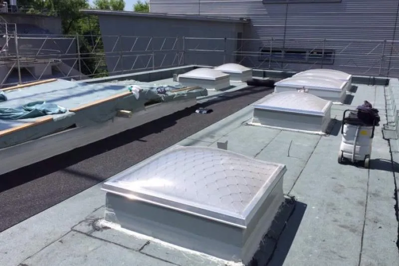 Galeriebild haxha-bauabdichtungen-flachdach-mit-fenstern.jpg