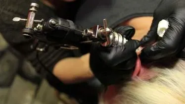 Unternehmen Skindependent Tattoo